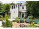 Beautiful two-story home with a well-manicured front yard and cozy fire pit area at 1503 Hollywood St, Durham, NC 27701