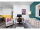 View of the combined dining, living, and office space with lots of natural light at 1503 Hollywood St, Durham, NC 27701