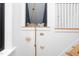 Wall decoration featuring climbing rope and rocks, enhancing this room's playful design at 1503 Hollywood St, Durham, NC 27701