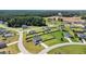 Aerial view of the residential neighborhood with large fenced in yards and mature trees at 171 Piney Field Rd, Fuquay Varina, NC 27526