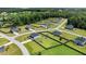 Aerial view of homes with large fenced backyards and playgrounds in a quiet neighborhood at 171 Piney Field Rd, Fuquay Varina, NC 27526