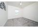 Bedroom with bright white walls, neutral carpet and a ceiling fan at 171 Piney Field Rd, Fuquay Varina, NC 27526