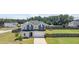 Charming two-story home with a two-car garage and a spacious fenced backyard and playground at 171 Piney Field Rd, Fuquay Varina, NC 27526