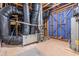 Unfinished basement showcasing the home's mechanics, including duct work, HVAC, and hot water heater at 192 Glenpark Pl, Cary, NC 27511