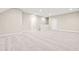 A large carpeted bonus room perfect for entertainment or recreation at 192 Glenpark Pl, Cary, NC 27511