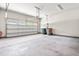 Spacious two-car garage with an automatic door, overhead lighting and neutral wall color at 192 Glenpark Pl, Cary, NC 27511