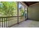 Relaxing screened porch with a view of the lush green backyard and plenty of shade at 192 Glenpark Pl, Cary, NC 27511