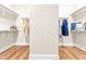Spacious walk-in closet with built-in shelving and hanging racks at 192 Glenpark Pl, Cary, NC 27511