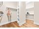 Large walk-in closet offers built-in shelving and hanging racks at 192 Glenpark Pl, Cary, NC 27511