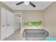 Spacious bedroom with a ceiling fan, soft carpet, and a fun alligator toy feature at 201 Crossfire Rd, Holly Springs, NC 27540