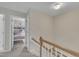Upstairs hallway leading to a bedroom with adorable bunk beds, bathed in natural light at 201 Crossfire Rd, Holly Springs, NC 27540