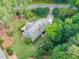 Stunning aerial view of a home with lush landscaping and a private driveway at 201 Village Dr, Knightdale, NC 27545