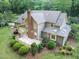 Aerial view showcasing the home's expansive back deck and patio area, perfect for outdoor entertaining at 201 Village Dr, Knightdale, NC 27545
