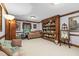 Bedroom with large bookcase and natural lighting at 201 Village Dr, Knightdale, NC 27545