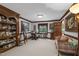 Bedroom with large bookcase and natural lighting at 201 Village Dr, Knightdale, NC 27545