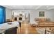 Open-concept living room flowing into the kitchen and dining area at 202 Hilltop Ave, Garner, NC 27529