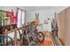 Bright storage room with wood floors and packed with furniture, artwork, and decor at 202 Hilltop Ave, Garner, NC 27529