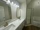 Beautiful bathroom with dual sink vanity, marble countertop, and glass shower doors at 2032 Sherry Lynn Dr, Garner, NC 27529