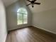 Bedroom with vaulted ceiling and a large window at 2032 Sherry Lynn Dr, Garner, NC 27529