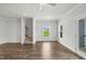 Open living room with hardwood floors and a staircase at 209 Broomgrove Way, Wake Forest, NC 27587