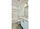 A clean, minimalist bathroom features a shower and vanity with modern hardware at 2313 Abbeyhill Dr # 3, Raleigh, NC 27610