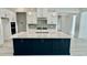 Beautiful kitchen with large island, stainless appliances, and white cabinets, perfect for cooking at 2313 Abbeyhill Dr # 3, Raleigh, NC 27610