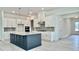 Bright, modern kitchen featuring an island, stainless appliances, and stylish white cabinetry at 2313 Abbeyhill Dr # 3, Raleigh, NC 27610