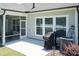 The back patio includes a screened in area, a grill, and a gas line for outdoor cooking at 2501 Impulsion Dr, New Hill, NC 27562
