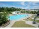 The community pool features a sundeck with ample chairs and tables at 2501 Impulsion Dr, New Hill, NC 27562
