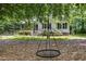 Spacious backyard featuring a tire swing hanging from a tree at 2805 Evans St, Durham, NC 27705