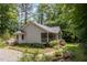 Inviting home exterior with a porch, deck, and lush landscaping at 2805 Evans St, Durham, NC 27705