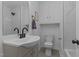 Bathroom featuring vanity with black hardware and a stylish walk-in shower at 307 Yowland Rd, Henderson, NC 27536