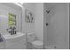 Bathroom featuring vanity with modern hardware and a stylish walk-in shower at 307 Yowland Rd, Henderson, NC 27536