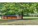 Spacious backyard featuring an above-ground pool, perfect for outdoor relaxation and recreation at 3208 Wilbon Ridge Dr, Holly Springs, NC 27540