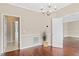 Traditional dining room boasts beautiful hardwood floors and elegant chandelier lighting at 3208 Wilbon Ridge Dr, Holly Springs, NC 27540