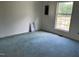 Bedroom featuring a window and carpeted flooring at 3213 Sam Usry Rd, Oxford, NC 27565