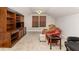 Comfortable bonus room with built-in shelving and a cozy seating area at 34 Tanglewood Pl, Angier, NC 27501
