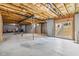 Spacious unfinished basement featuring a walkout to the exterior at 3404 Mount Pisgah Way, Cary, NC 27519