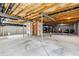 Unfinished basement awaiting customization with exposed beams and concrete flooring at 3404 Mount Pisgah Way, Cary, NC 27519