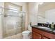 A bathroom with glass shower, sink and toilet at 3404 Mount Pisgah Way, Cary, NC 27519