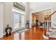 Elegant foyer with French doors, hardwood floors, and views into the formal dining room at 3404 Mount Pisgah Way, Cary, NC 27519