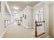 A hallway with white trim and carpet at 3404 Mount Pisgah Way, Cary, NC 27519