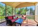 A screened in porch with furniture at 3404 Mount Pisgah Way, Cary, NC 27519