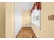Hallway with wood floors and plenty of natural light at 360 Country Way, Sanford, NC 27332