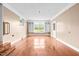 Spacious and bright living room with hardwood flooring and large windows at 360 Country Way, Sanford, NC 27332