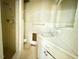 Bathroom with linoleum floors, shower stall, sink with counter and storage at 3716 Rivermont Rd, Durham, NC 27712