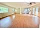 Open-concept living area with laminate floors and bright natural light at 3716 Rivermont Rd, Durham, NC 27712