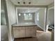Eat-in kitchen featuring a granite countertop island and decorative lighting above at 3804 Cobb St, Garner, NC 27529