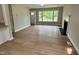 Spacious living room with hardwood floors and a fireplace at 3804 Cobb St, Garner, NC 27529