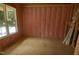 New construction bedroom with stud walls, insulation, and a large window for natural light at 4109 Stonewall Dr, Raleigh, NC 27604